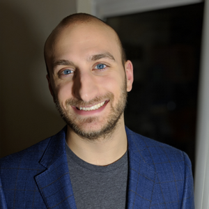 Professional headshot of Alex Elias.